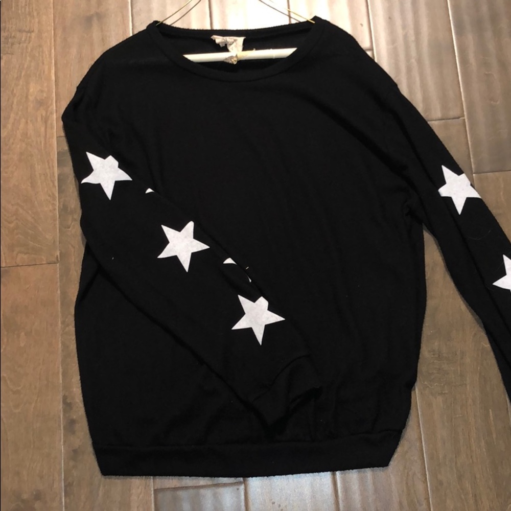Black sweater with star detail